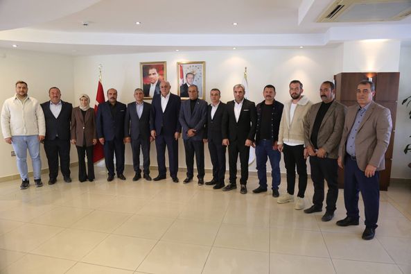 MHP’DEN ERKOYUNCU’YA ZİYARET 
